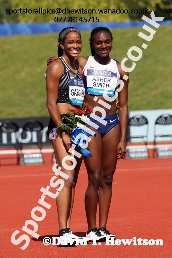 English Gardner (USA) winner of the womens 100 metres final with Dina Asher-Smith (GB), IAAF Diamond League, Birmingham. Photo: David T. Hewitson/Sports for All Pics